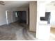 Open living room with view into adjacent room at 3748 Skyline St, Logandale, NV 89021