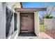 Front door entry with tiled flooring and sidelights at 3998 Foxgrove Dr, Las Vegas, NV 89147