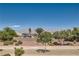 View of home with desert landscape and mountain views at 4104 Midnight Crest Ave, North Las Vegas, NV 89031