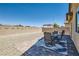 Relaxing backyard patio with seating and a pergola at 4104 Midnight Crest Ave, North Las Vegas, NV 89031