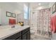 Clean bathroom with shower/tub combo and updated vanity at 4104 Midnight Crest Ave, North Las Vegas, NV 89031