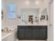 Double vanity bathroom with a soaking tub and shower at 4104 Midnight Crest Ave, North Las Vegas, NV 89031