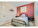 Charming bedroom with full bed and artistic wall decor at 4104 Midnight Crest Ave, North Las Vegas, NV 89031