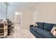 Multi-functional bedroom with a sofa, a desk, and bathroom access at 4104 Midnight Crest Ave, North Las Vegas, NV 89031