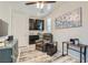 Cozy bonus room features a kitchenette, desk, and comfortable seating at 4104 Midnight Crest Ave, North Las Vegas, NV 89031