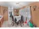 Dining area with a square table and four chairs at 4212 Paramount St, Las Vegas, NV 89115