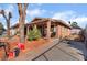 House exterior with a covered porch and landscaping at 4212 Paramount St, Las Vegas, NV 89115