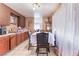 Cozy kitchen featuring wood cabinets and a dining area at 4212 Paramount St, Las Vegas, NV 89115