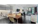 Open living room with dark hardwood floors and city views at 4381 W Flamingo Rd # 2306, Las Vegas, NV 89103