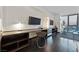 Home office with built in shelving and a large desk at 4381 W Flamingo Rd # 2306, Las Vegas, NV 89103