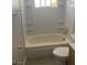 Clean bathroom with a bathtub, toilet, and updated vanity at 4745 E Flamingo Rd, Las Vegas, NV 89121