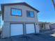 Two-story house with a two-car garage and modern facade at 4745 E Flamingo Rd, Las Vegas, NV 89121