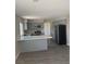 Modern kitchen with gray cabinets and quartz countertops at 4745 E Flamingo Rd, Las Vegas, NV 89121
