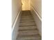 Modern stairs with light gray wood-look laminate at 4745 E Flamingo Rd, Las Vegas, NV 89121