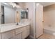 Bathroom boasting a vanity with sink and a separate tub and shower at 4872 Nara Vista Way # 101, Las Vegas, NV 89103