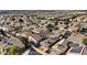 Aerial view of houses with solar panels and desert landscape at 5184 Mineral Lake Dr, Las Vegas, NV 89122