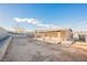 Spacious backyard with covered patio and block wall at 6215 Newville Ave, Las Vegas, NV 89103