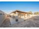 Spacious backyard with covered patio and block wall at 6215 Newville Ave, Las Vegas, NV 89103