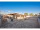 Large backyard with covered patio and block wall at 6215 Newville Ave, Las Vegas, NV 89103