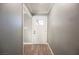 Inviting entryway with light gray walls and wood-look flooring at 6215 Newville Ave, Las Vegas, NV 89103