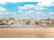 Single-story house with a landscaped yard and driveway at 6215 Newville Ave, Las Vegas, NV 89103