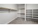 Large walk-in closet with ample shelving and hanging space at 6265 N Eula St, Las Vegas, NV 89149