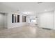 Spacious dining area with stylish chandelier and gray walls at 6265 N Eula St, Las Vegas, NV 89149