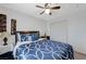 Bedroom with ceiling fan and double door closet at 6276 Point Isabel Way, Las Vegas, NV 89122