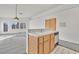 Bright kitchen features light wood cabinets, neutral countertops, and a dishwasher at 6505 Moon Roses Ct, Las Vegas, NV 89108