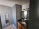 Bathroom with granite countertops, a mirror, and good lighting at 7200 Pirates Cove Rd # 2005, Las Vegas, NV 89145