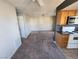 Wide view of the kitchen and living room space at 7200 Pirates Cove Rd # 2005, Las Vegas, NV 89145