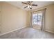 Comfortable bedroom with neutral decor and a large window at 7642 Riva Ridge St, Las Vegas, NV 89149