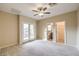Bright bedroom with balcony access and carpet at 7642 Riva Ridge St, Las Vegas, NV 89149
