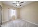 Bedroom with ceiling fan and window coverings at 7642 Riva Ridge St, Las Vegas, NV 89149