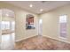 Well-lit dining area with a view of the kitchen and access to the backyard at 7642 Riva Ridge St, Las Vegas, NV 89149