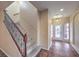 Elegant entryway with a staircase and tile flooring at 7642 Riva Ridge St, Las Vegas, NV 89149