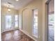 Elegant entryway with tile flooring and stained glass door at 7642 Riva Ridge St, Las Vegas, NV 89149