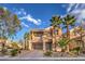 Two-story house with palm trees and a paved driveway at 7642 Riva Ridge St, Las Vegas, NV 89149