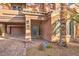 Front entrance with decorative door and brick walkway at 7642 Riva Ridge St, Las Vegas, NV 89149