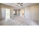 Spacious main bedroom with walk-in closet and carpet at 7642 Riva Ridge St, Las Vegas, NV 89149