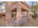 Covered patio with brick pavers and access to backyard at 7642 Riva Ridge St, Las Vegas, NV 89149