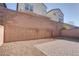 Small backyard with gravel and brick pavers at 826 N Water St, Henderson, NV 89011