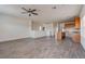 Open living room with hardwood floors and ceiling fan at 826 N Water St, Henderson, NV 89011