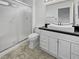 Bathroom with granite vanity and large shower at 8509 Goodhaven Dr, Las Vegas, NV 89134