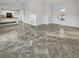 Bright living room with tile floors and access to kitchen at 8509 Goodhaven Dr, Las Vegas, NV 89134