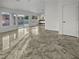 Bright and spacious living room with tile flooring and access to backyard at 8509 Goodhaven Dr, Las Vegas, NV 89134