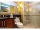 Clean bathroom with a shower, toilet and modern vanity at , Las Vegas, NV 89109
