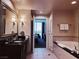 Upscale bathroom boasting a soaking tub and a view into the bedroom at , Las Vegas, NV 89109