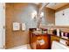 Convenient bathroom with vanity, toilet and large mirror at , Las Vegas, NV 89109