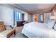 Bedroom with king bed, seating area, and en-suite bathroom at , Las Vegas, NV 89109